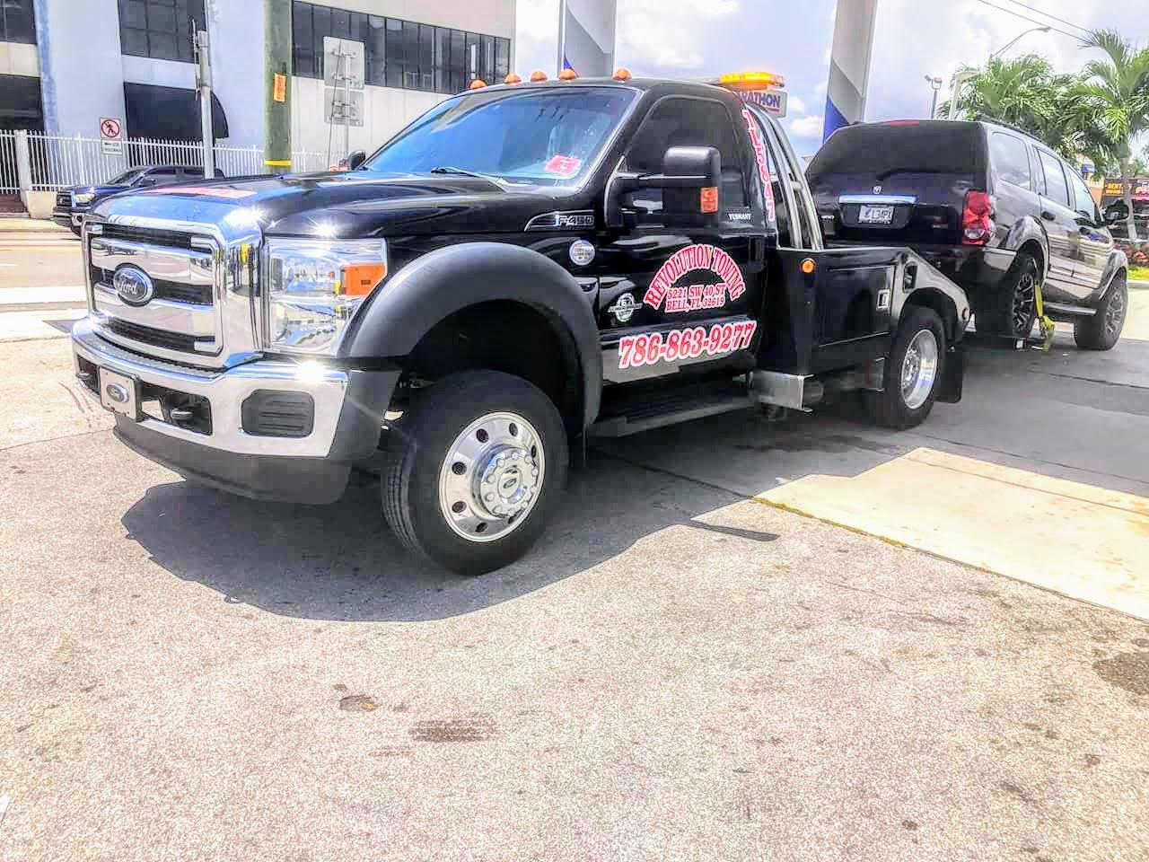 Revolution Towing truck responding to a call in Miami